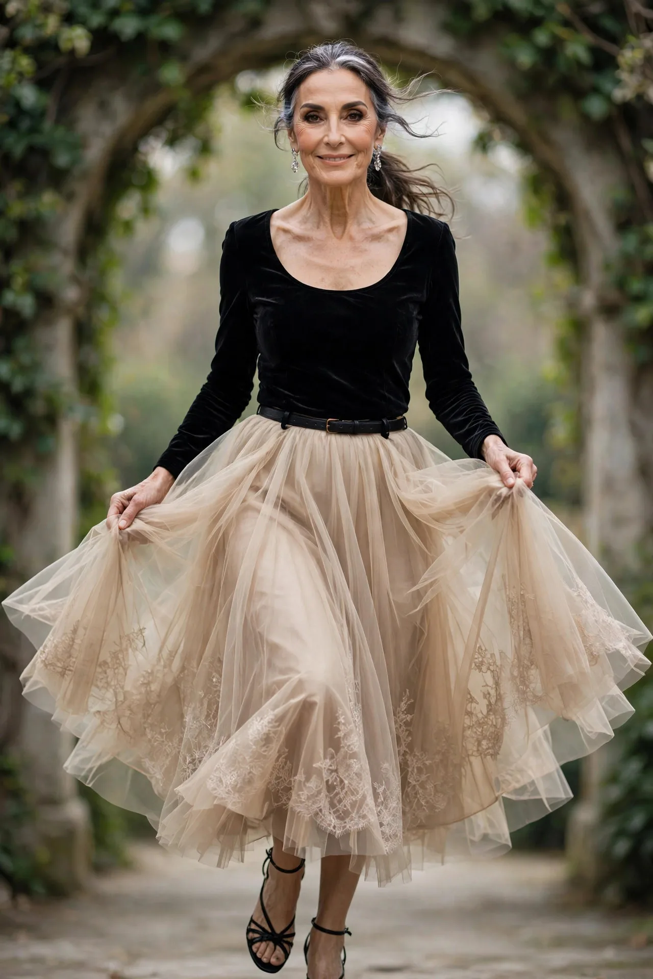 Tulle Champagne Dream — A champagne tulle full midi skirt worn with a black velvet fitted scoop-neck top tucked in and a thin black belt, finished with black strappy heeled sandals.