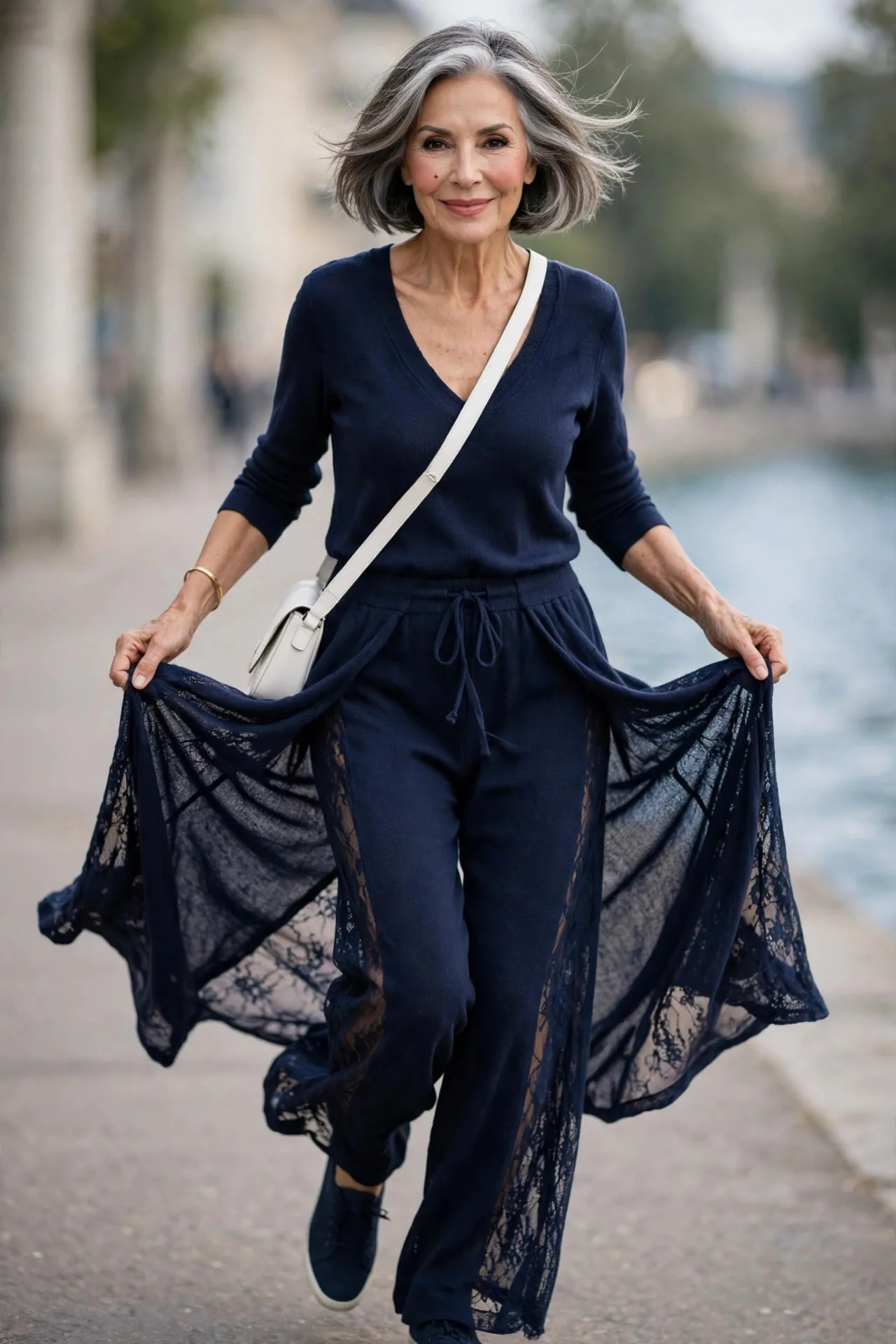 Jumpsuit, New Chapter — A navy soft-knit jumpsuit with a drawstring waist, V-neckline, and wide easy legs.