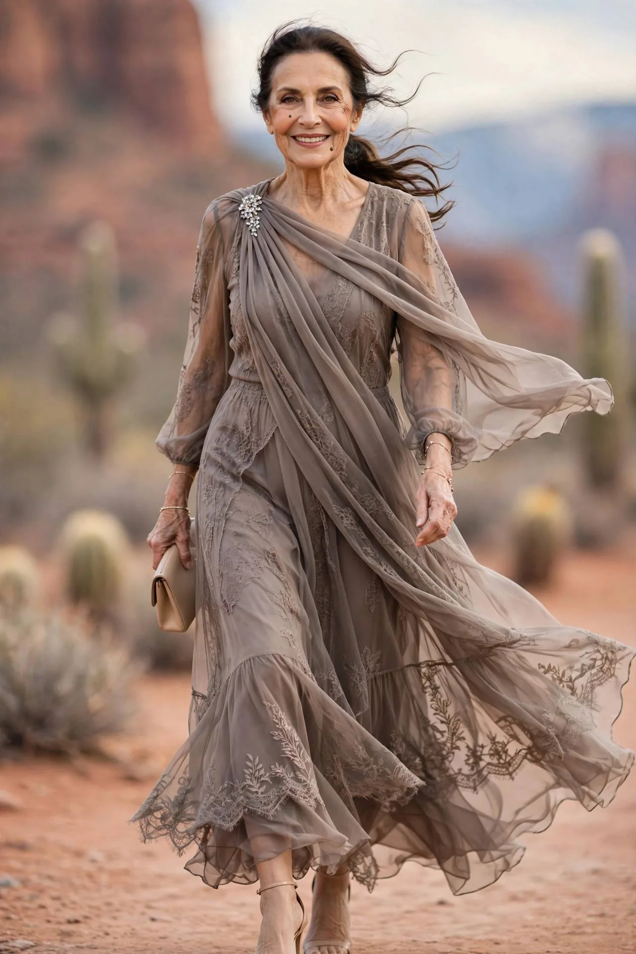 Elegant older woman in taupe chiffon maxi dress with crystal dress pin