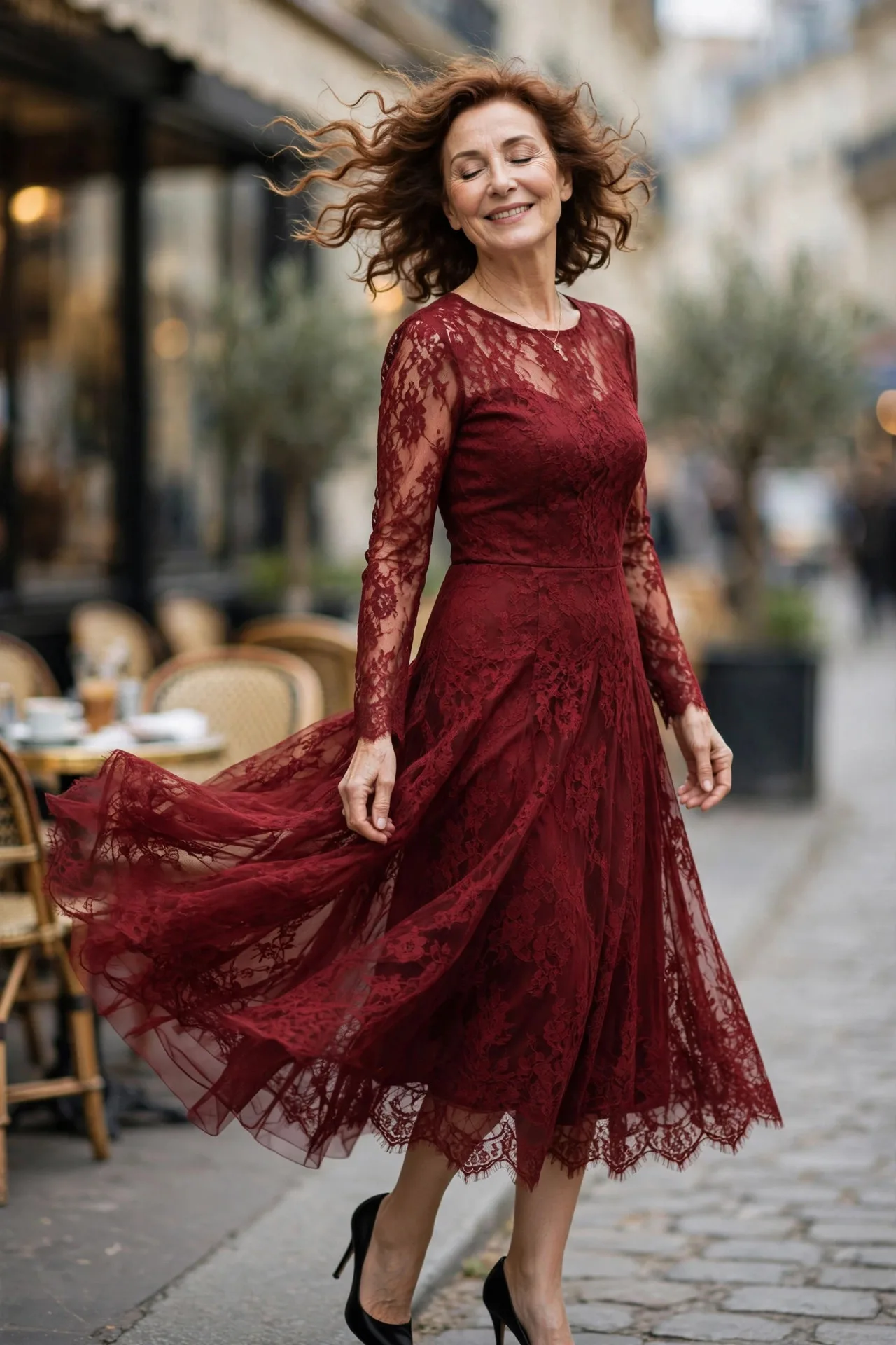 Garnet Lace Luxe — A garnet-red lace midi dress with long sleeves, a fitted bodice, a scalloped hem and an A-line skirt, worn with black satin pointed-toe heels.