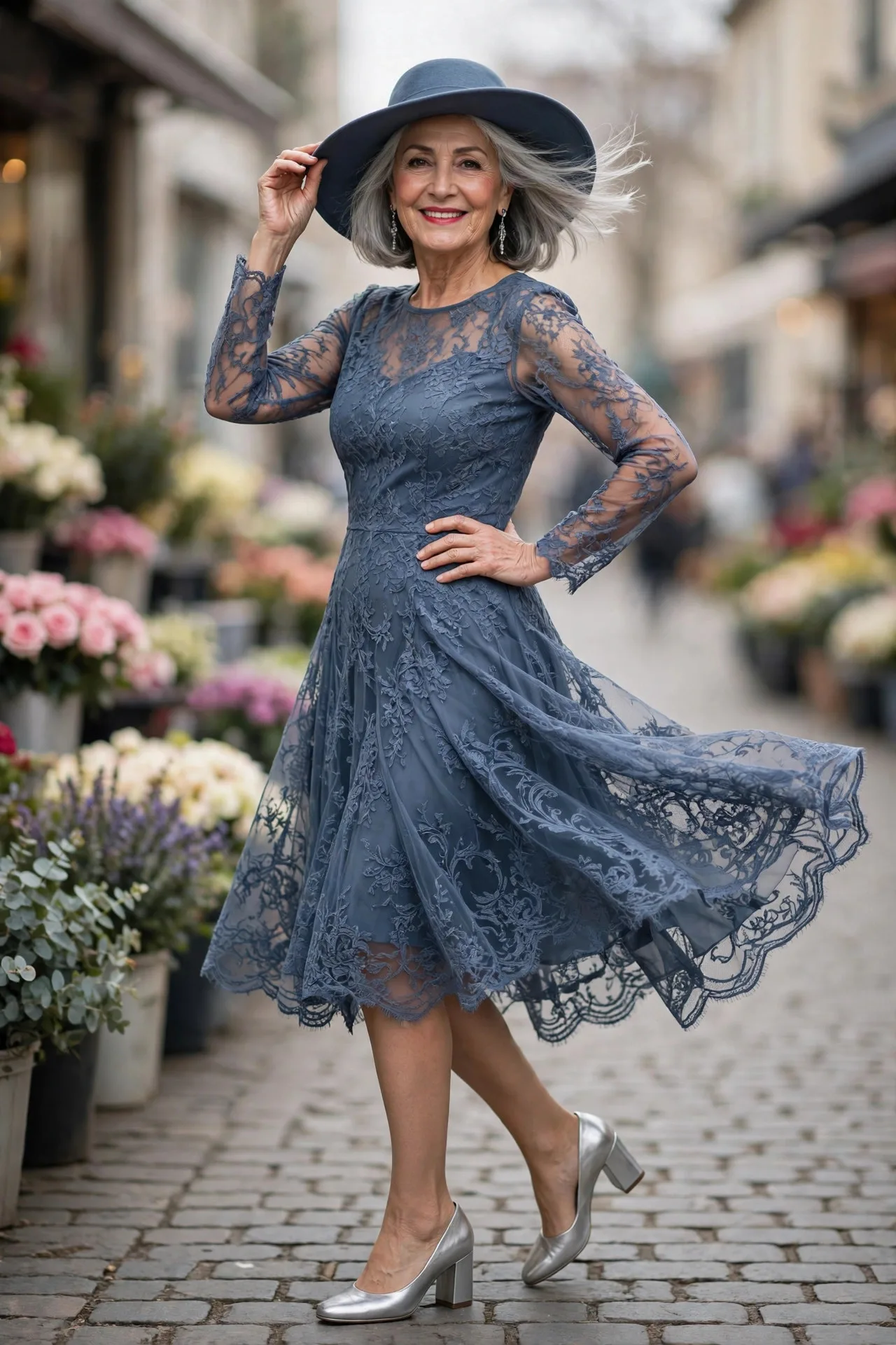 Happy mature woman walking gracefully in slate blue lace fit-and-flare dress