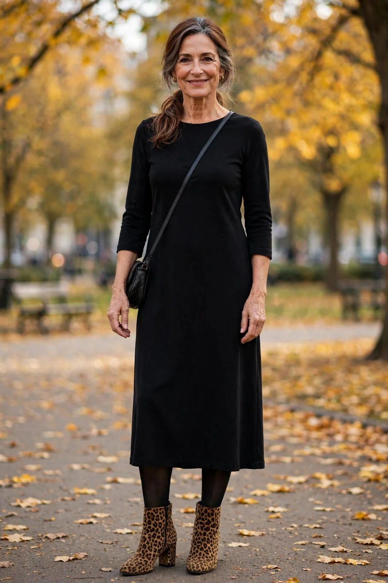 Autumn outfit with leopard print booties styled alongside chocolate midi dress