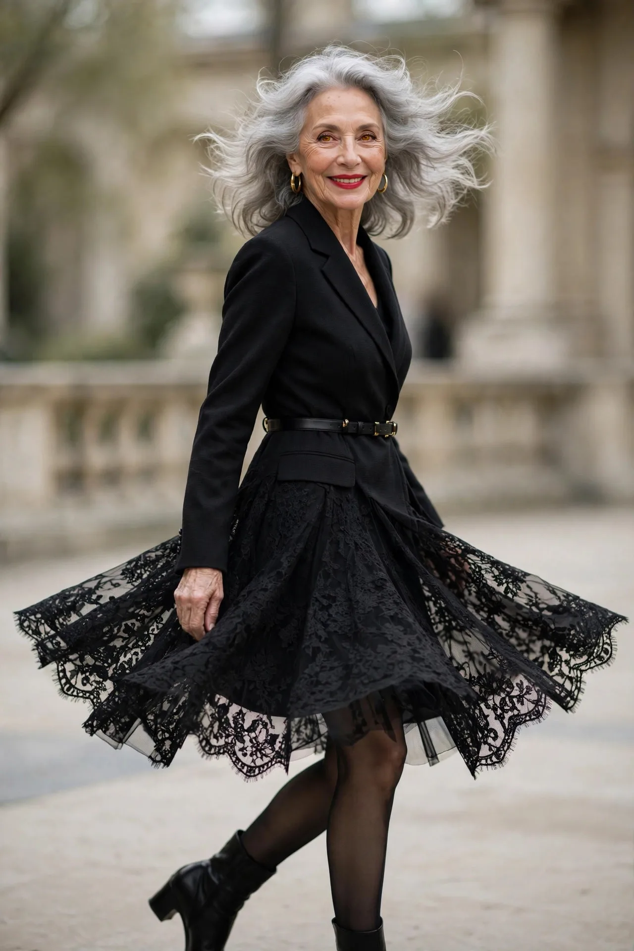 Blazer Dress Boldness — A black tailored blazer worn as a dress — belted at the waist, hem hitting mid-thigh — with sheer tights and low-heel knee boots.