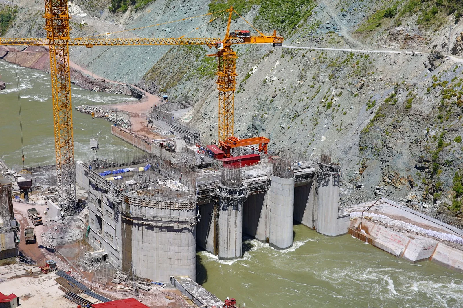 Dam Construction Progress: River Flows Through the New Spillway as Other Structures Take Shape